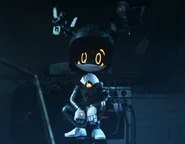 Akycha squatting on an office chair.
