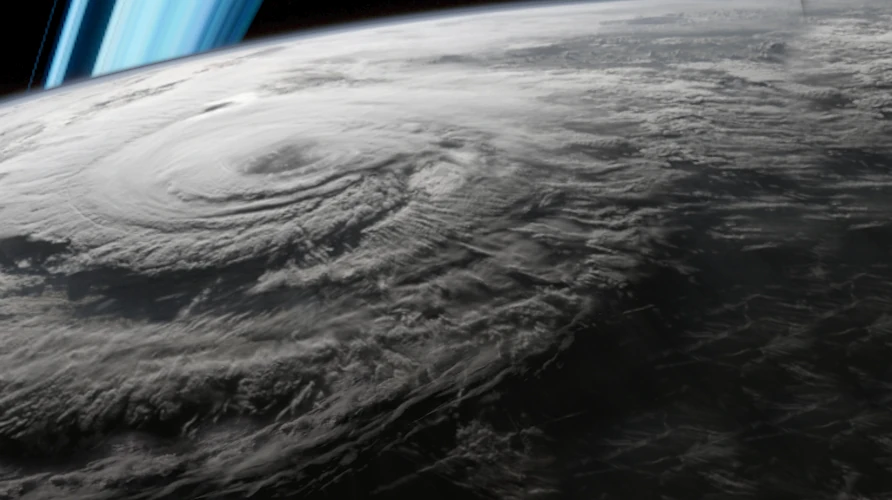 The south polar permanent hurricane as observed from low orbit. The storm's eye wall is estimated to exceed 800 km in diameter.